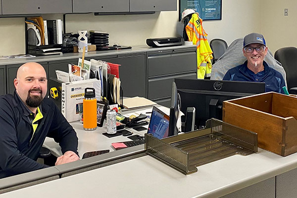 Dispatchers working at their desks in the office