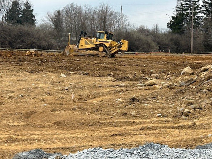 Stripping topsoil