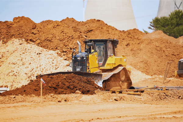 Photo of a CAT dozer moving dirt