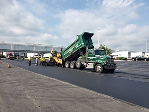 paving truck on job site