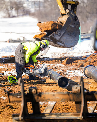 Cutting pipe for a new water main