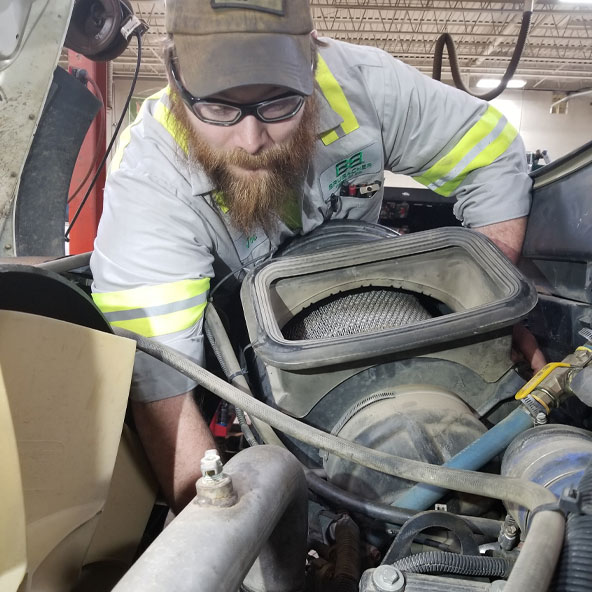 Diesel technician working in the shop