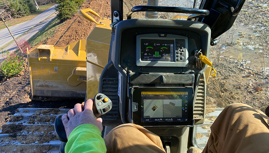 Brubacher Employee on Machine showing Technology