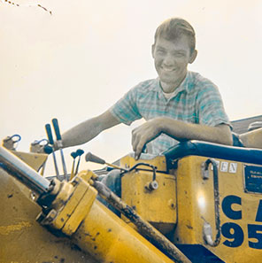 Young Ben Brubacher on Cat 955